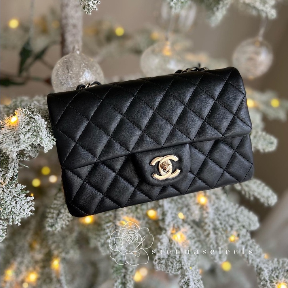 Authentic Chanel Mini Rectangle Classic Flap in black lambskin with lghw